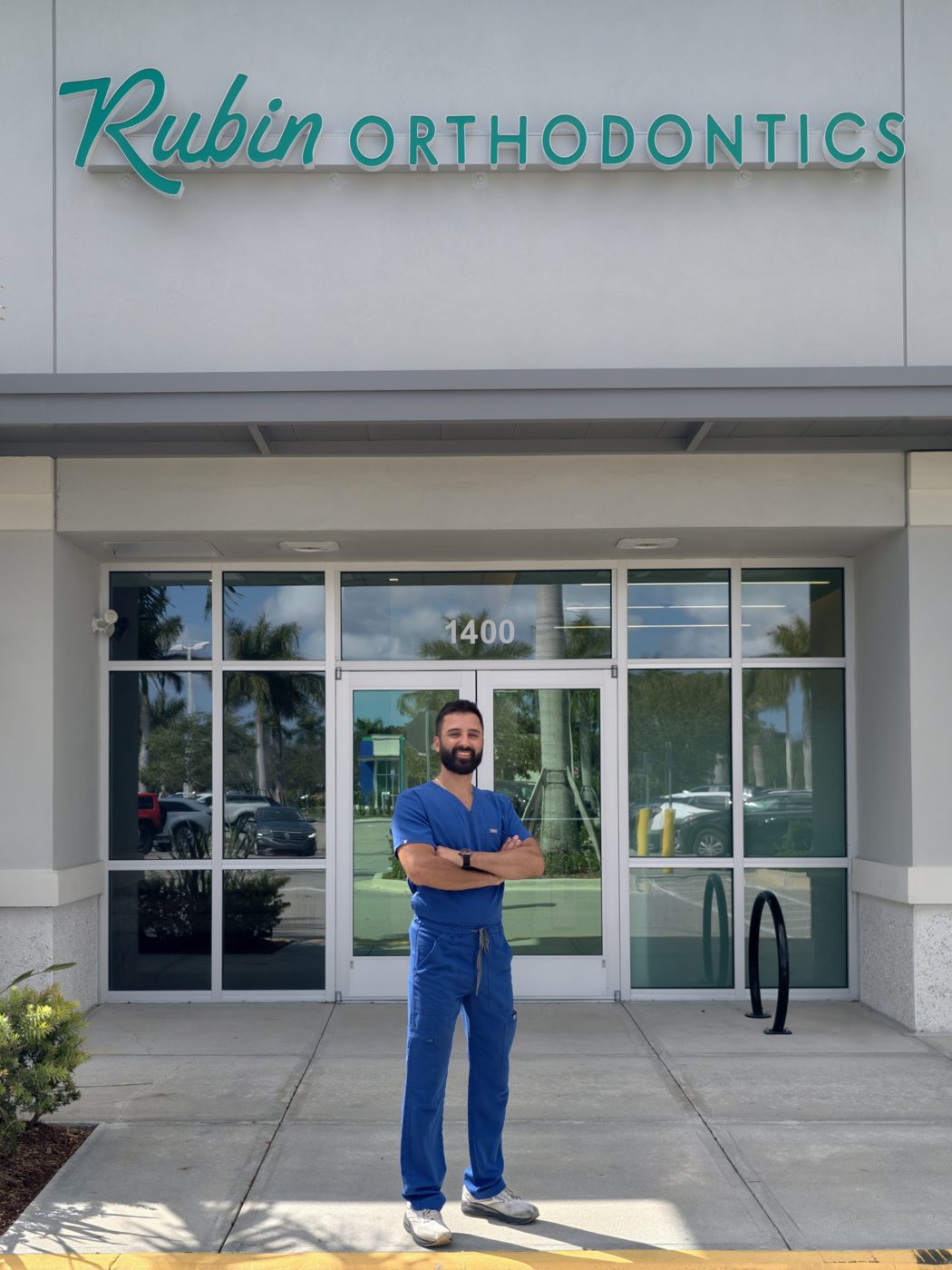 Dr. George Rubin standing in front of Rubin Orthodontics